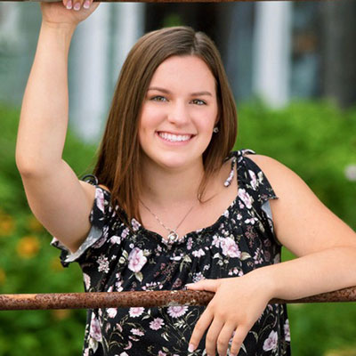 Headshot of Birthday Parties Co-Director Olivia Dean.